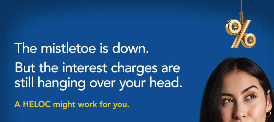 The mistletoe is down. But the interest charges are still hanging over your head. Woman with percentage symbol overhead