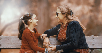 Mother talking to daughter.