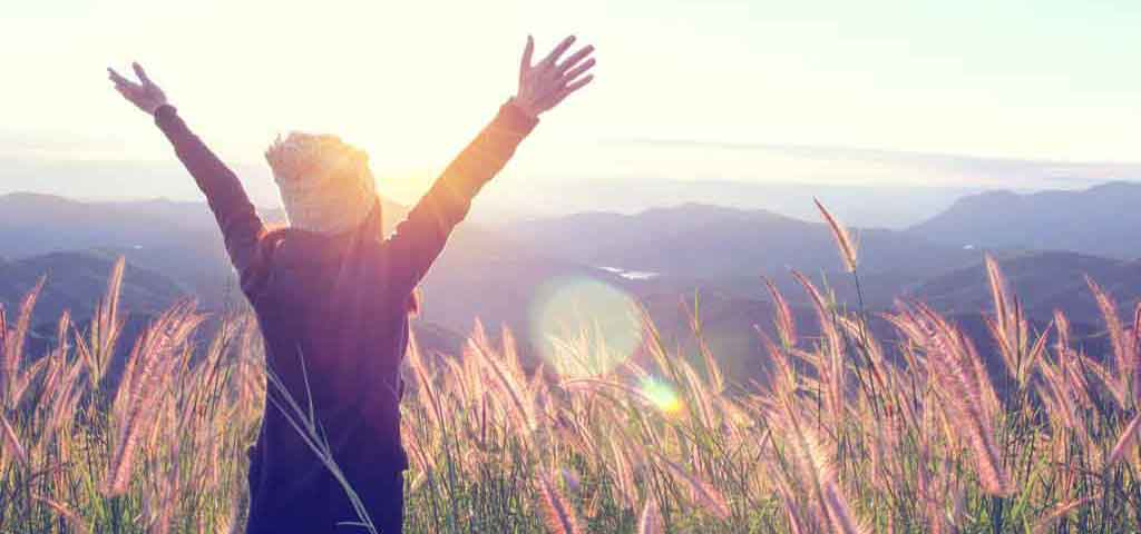 Girl with hand in the air